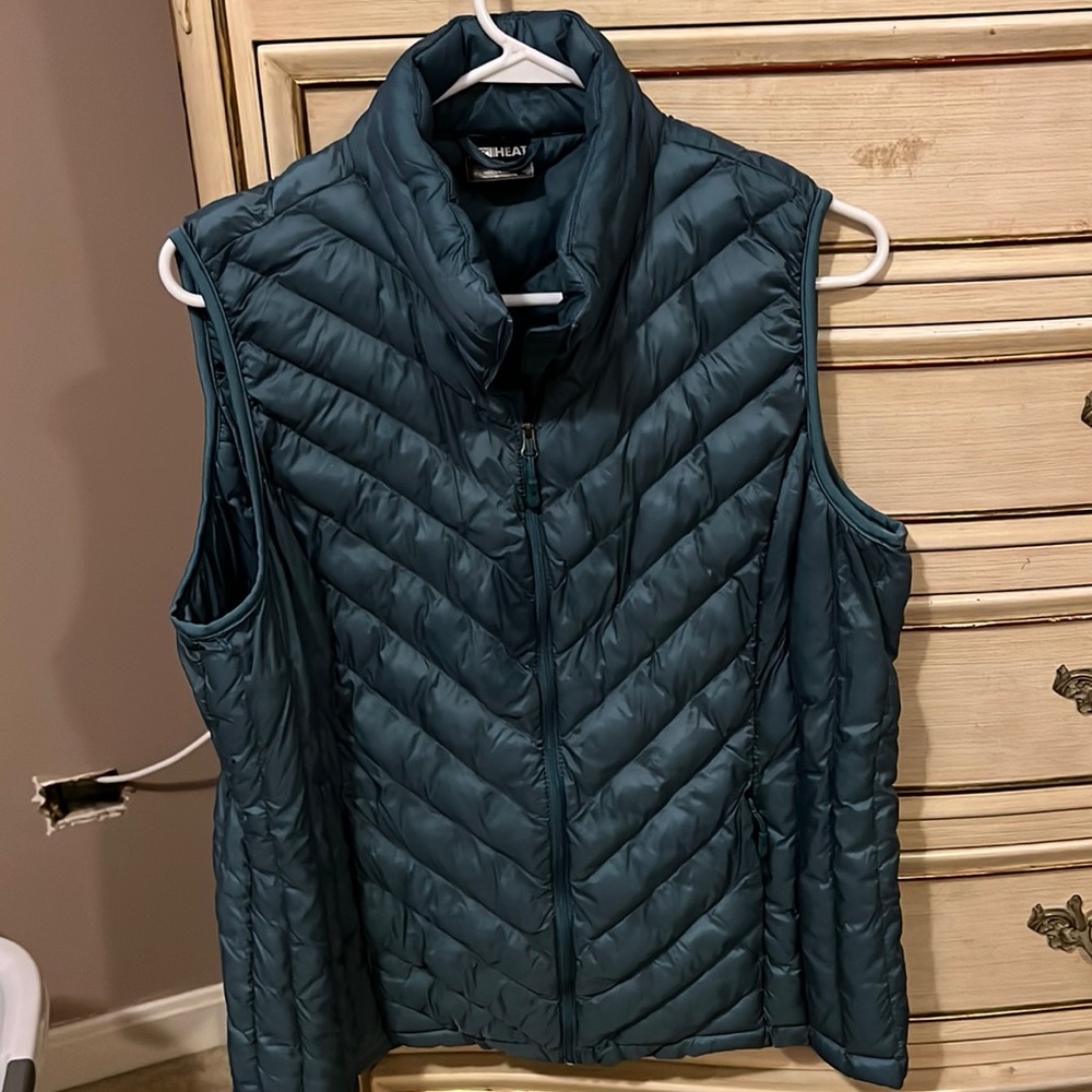 Zip up vest. Light blue green. Size xl. Great for layering for fall or winter.